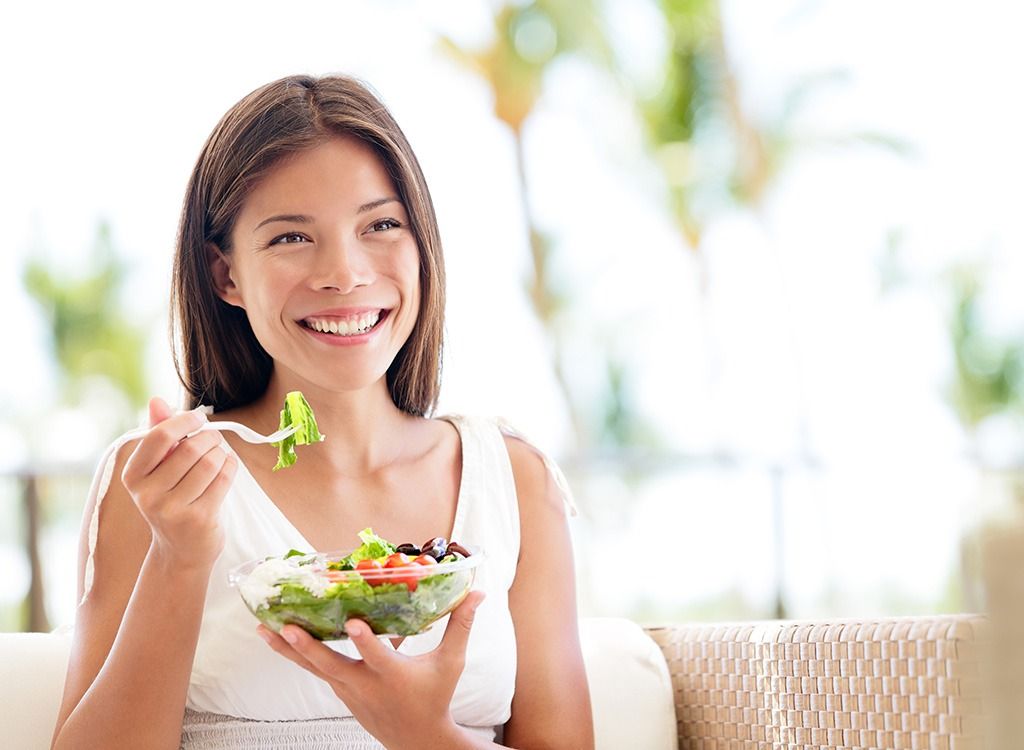 happy-woman-eating-salad-ed63d09f3c2d572c159861d9ba1cf2c5.jpg