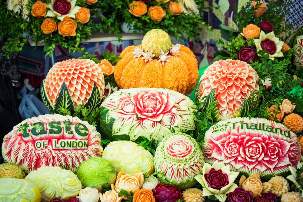 taste-of-thailand-fruit-carving-display-fcf4b165dfdca40ed9d203af936588af.jpg