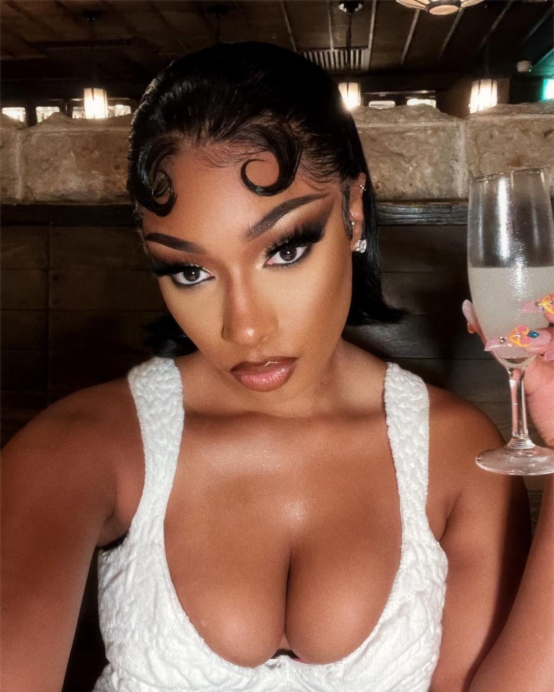 Megan Thee Stallion showed her signs while visiting Japan